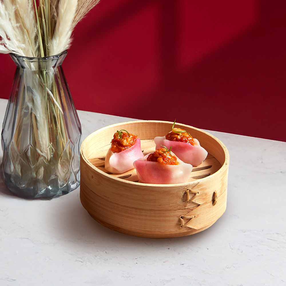 Steamed Prawn Dumpling topped with Chilli Crab Sauce